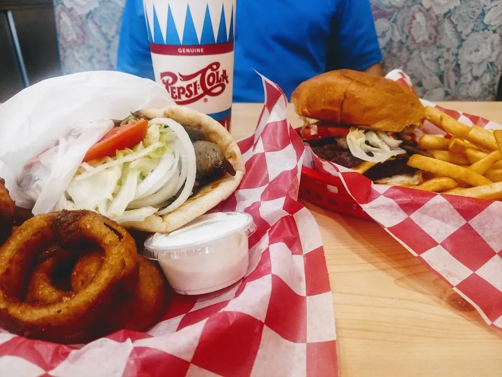 Gyros with Onion Rings and Cheeseburger with Fries